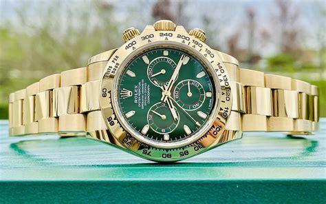 gold and green face rolex